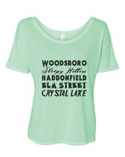 Load image into Gallery viewer, Horror Cities Woodsboro Sleepy Hollow Haddonfield Elm Street Crystal Lake Slouchy Tee - Wake Slay Repeat